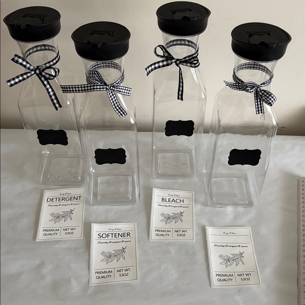 Set of 4 Clear plastic Bottles with Black Lids and Ribbons food laundry pantry